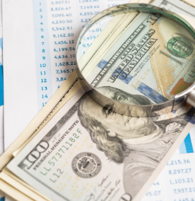 magnifying-glass-on-charts-graphs-paper-1