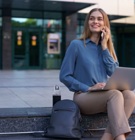 woman-talking-on-mobile-phone-and-working